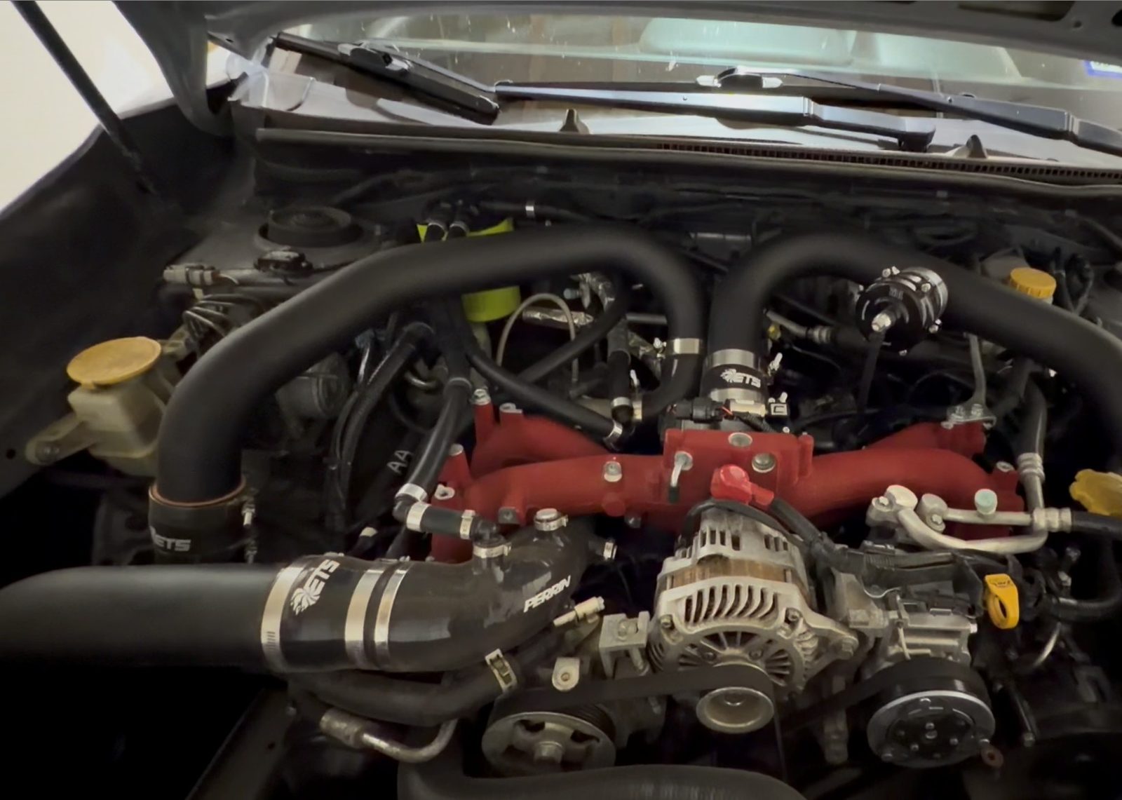 A Subaru engine bay worked on at Springs Auto Repair